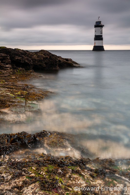 Penmon Point lighthouse on the coast of Anglesey, North Wales
