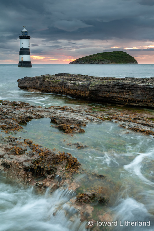 Penmon Point lighthouse and Puffin Island at dawn, Anglesey, North Wales