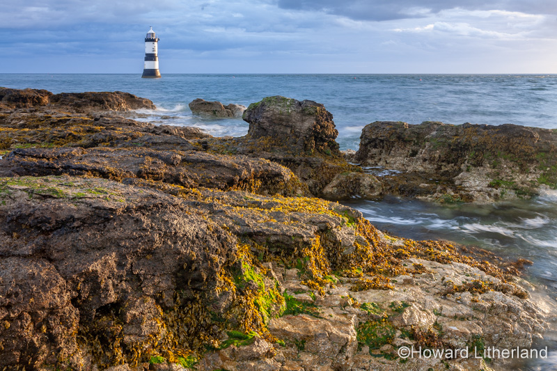 Penmon Point lighthouse in the morning sun, Anglesey, North Wales