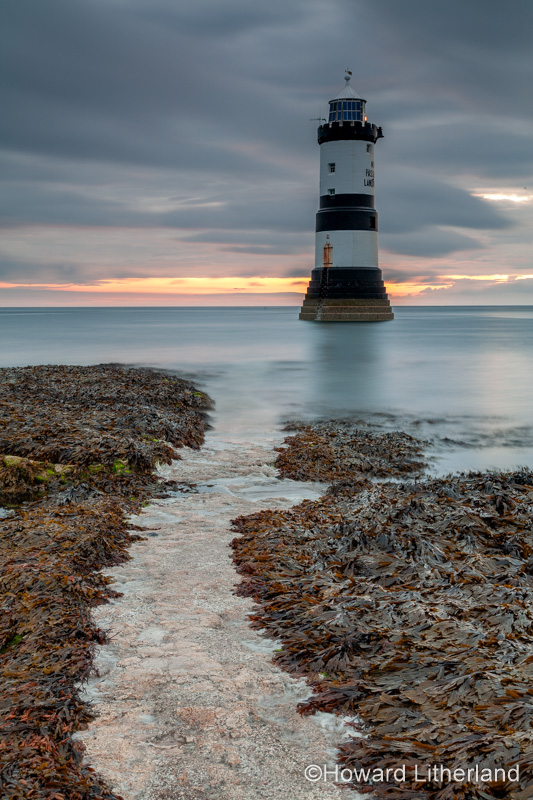 Penmon Point lighthouse at dawn, Anglesey, North Wales