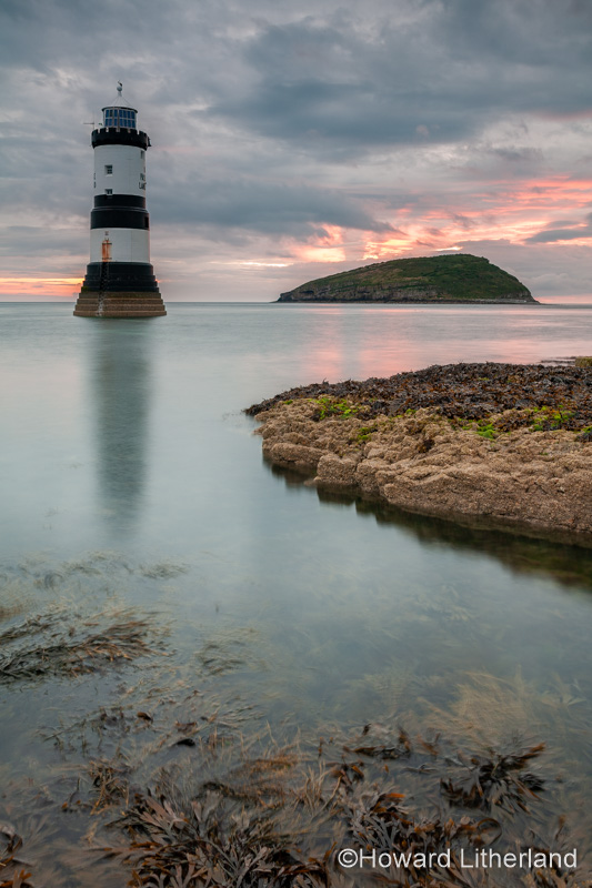 Penmon Point lighthouse at dawn, Anglesey, North Wales