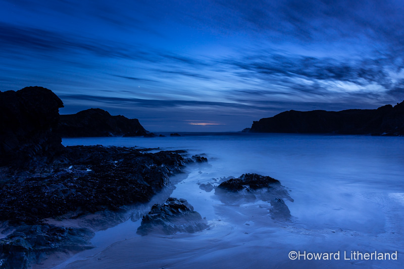 Dusk over the beach at Porth Dafarch on the Anglesey coast, North Wales