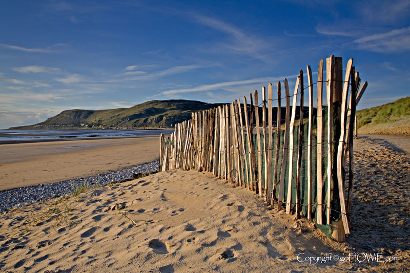 Fence and beach, Llandudno, North Wales