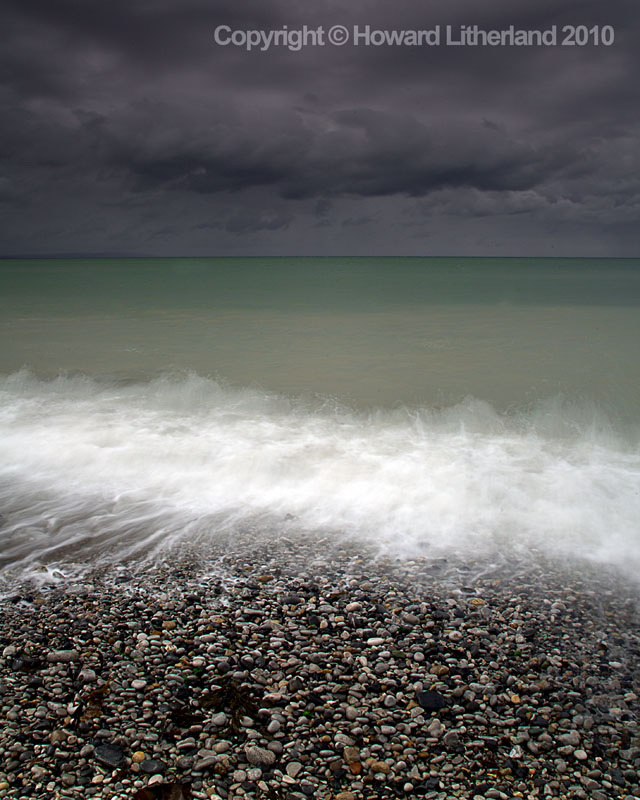 Waves on shingle beach, Penmon, Anglesey