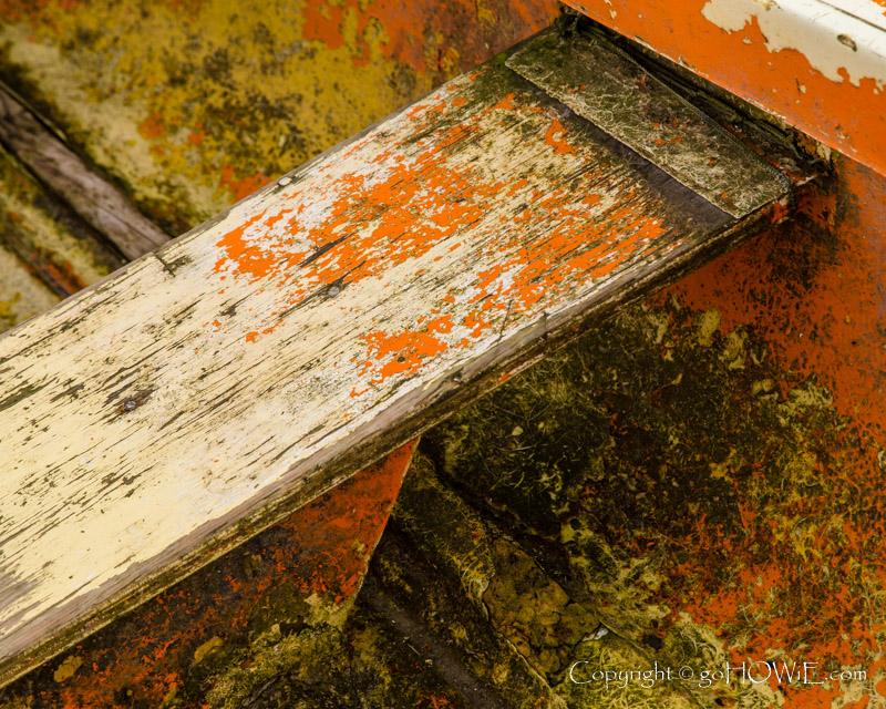 Decaying boat seat and hull, Moelfre, Anglesey, North Wales