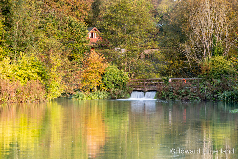 Tranquil pool in autumn at Caerwys, North Wales