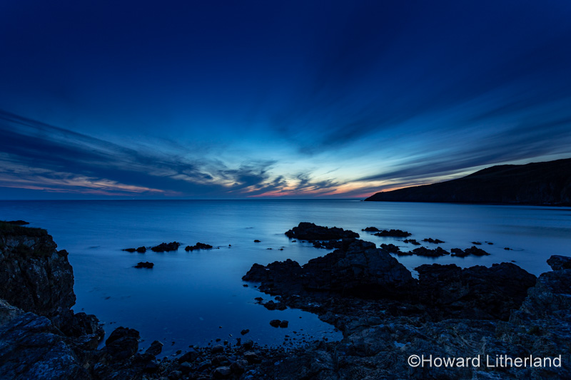 Church Bay at dusk on a high tide, Anglesey, North Wales