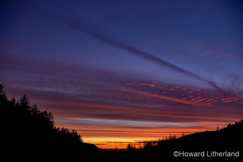 Colourful clouds at sunrise over the Clwydian Range AONB, North Wales