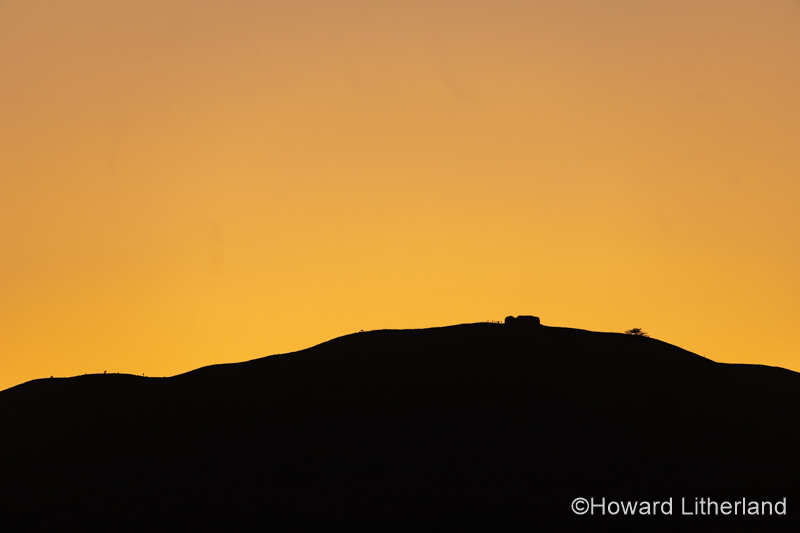 Jubliee Tower in silhouette on the summit of Moel Famau, North Wales
