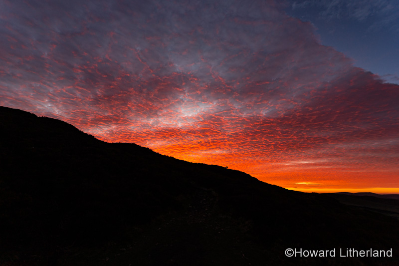 Clouds at sunrise over Foel Fenlli, Clwydian Range, North Wales