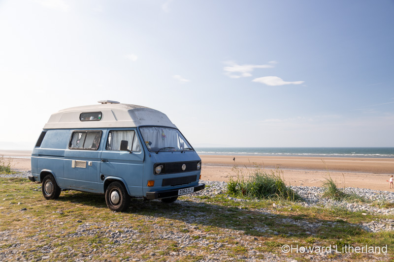 VW campervan at Llanddona Beach, Anglesey, North Wales