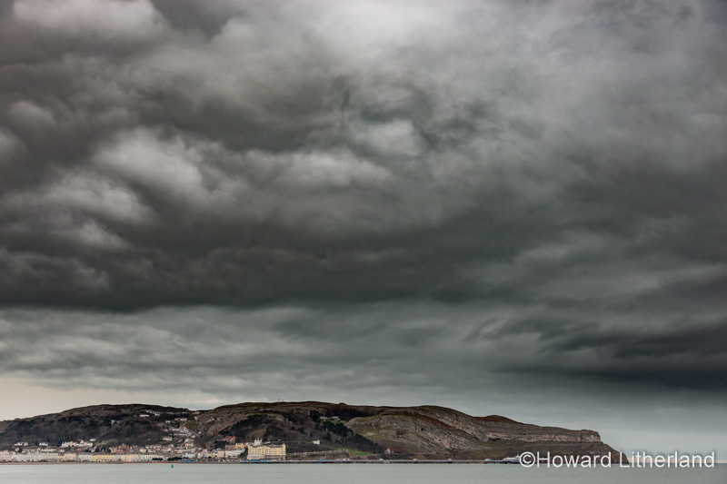 Storm clouds over the Great Orme at Llandudno on the North Wales coast