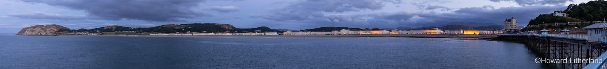 Panorama of Llandudno North Shore on the North Wales coast at dusk, as seen from the end of the Victorian pier