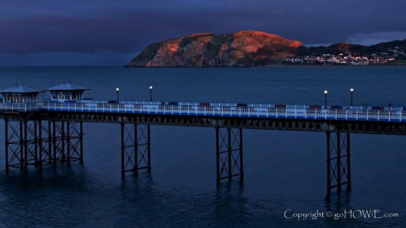Llandudno Pier and the Little Orme at sunset, North Wales coast