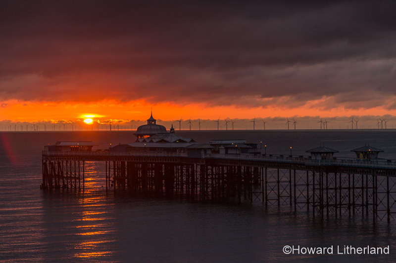 Sunrise over the Victorian pier at Llandudno on the North Wales coast