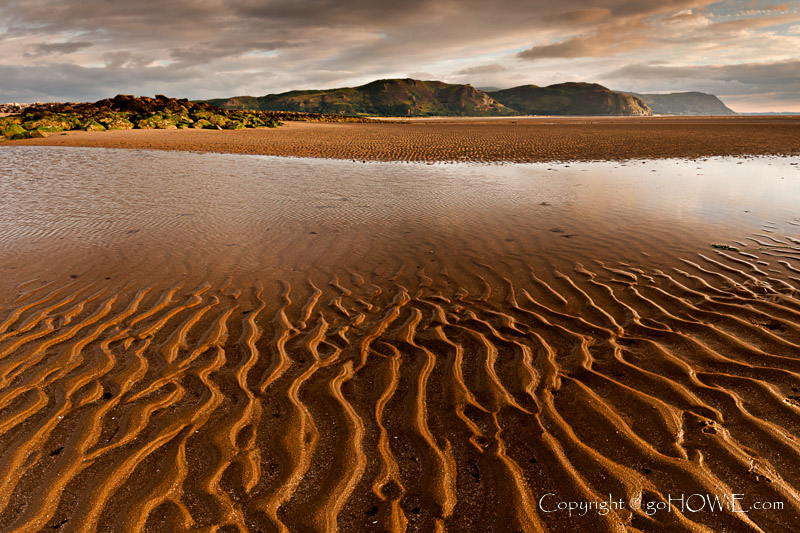 Photo showing a tidal pool on the beach at the West Shore, Llandudno, on the North Wales coast