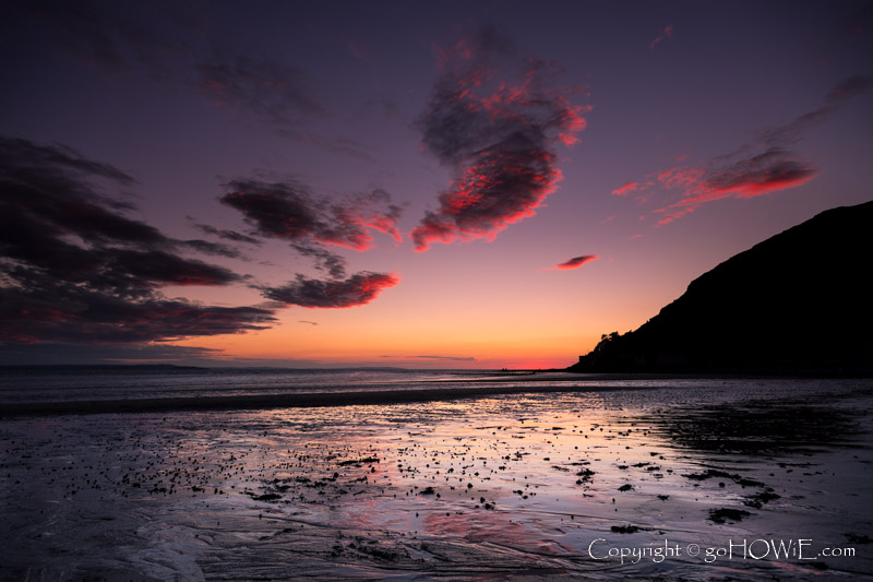 Colourful clouds at sunset over the West Shore, Llandudno, on the North Wales coast