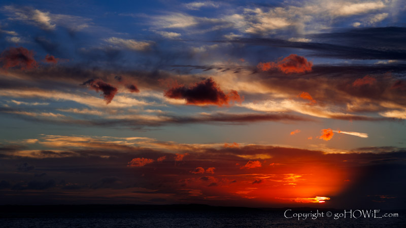 Colourful clouds at sunset over the West Shore, Llandudno, on the North Wales coast