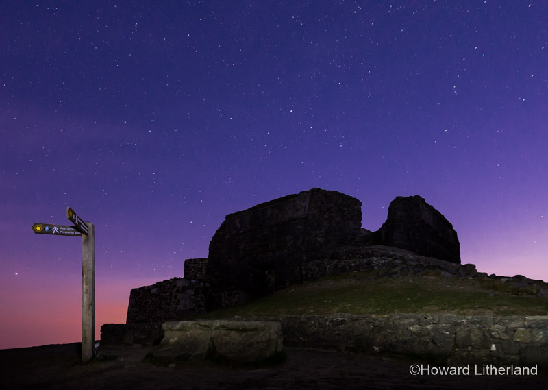 The ruined Jubilee Tower at dawn on the summit of Moel Famau in the Clwydian Range AONB, North Wales