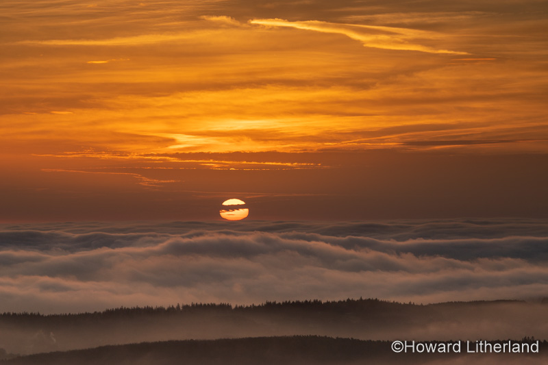 Sunrise over fog shrouded hills, Clwydian Range, North Wales