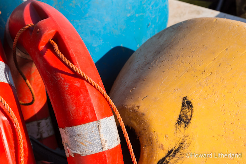 Buoy and lifebelt details on the beach at Moelfre, Anglesey, North Wales