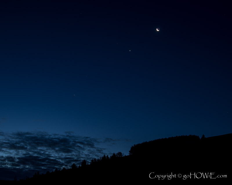 A waning crescent moon in conjunction with the planets Venus, Mars and Jupiter at dawn, Feol Fenlli North Wales