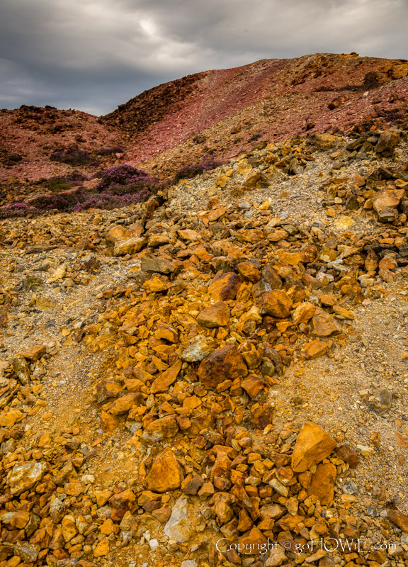 Colourful rocks in the abandoned Parys Mountain copper mine at Amlwch, Anglesey, North Wales