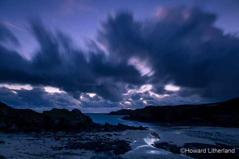 The beautiful Porth Dafarch beach at dusk on the Isle of Anglesey, North Wales
