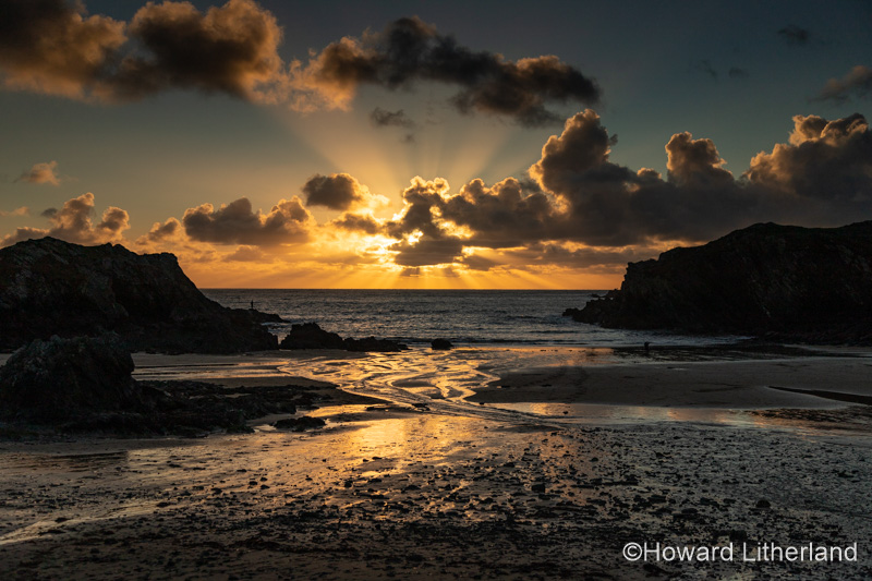 Sunset over the beach at Porth Dafarch, Anglesey, North Wales