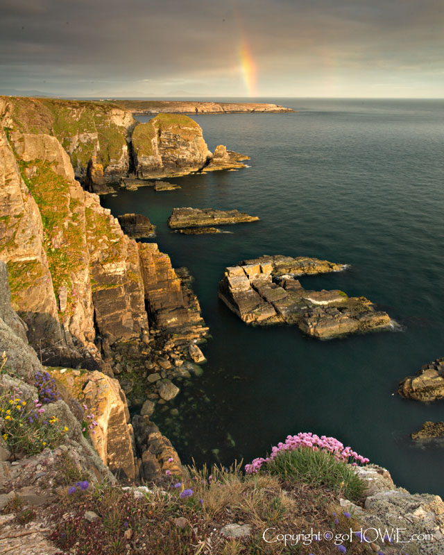 Rainbow over the cliffs at South Stack, Anglesey, North Wales