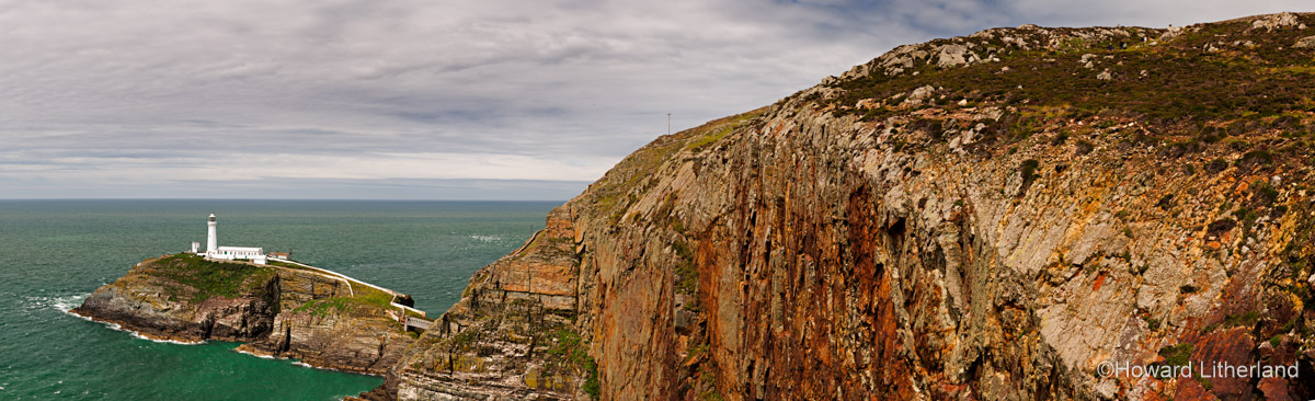 Panoramic image of the cliffs and lighthouse at South Stack on the Isle of Anglesey, North Wales