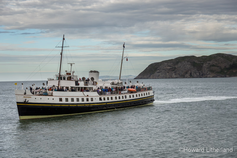 The steamer Balmoral as it sails past the Little Orme in Llandudno Bay on the North Wales coast