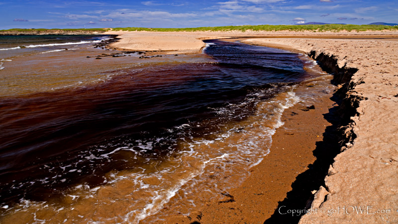 Beach and river at Dugort on Achill Island, County Mayo, Ireland