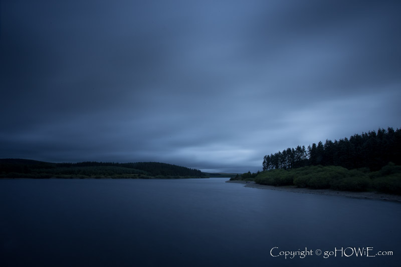 Alwen Reservoir under cloudy skies at dusk, North Wales