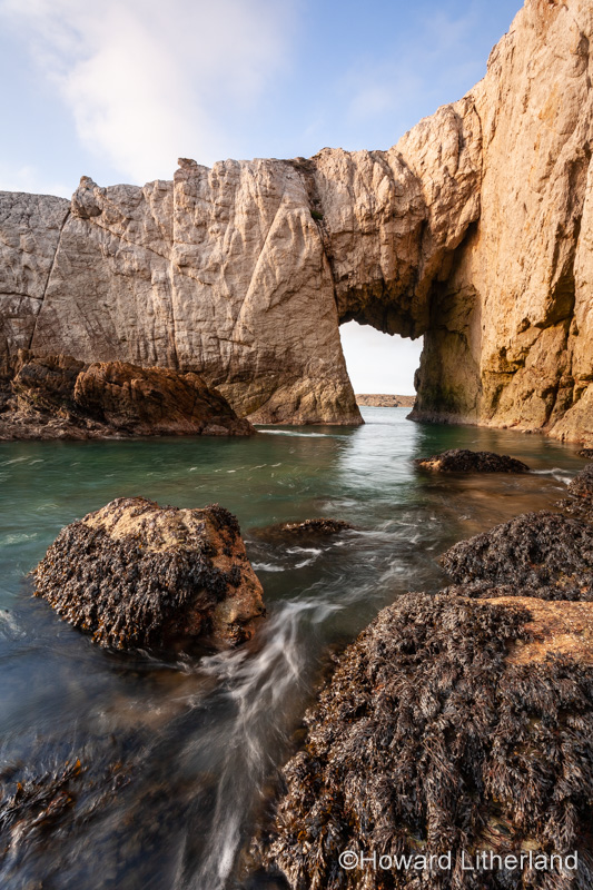 Bwa Gwyn sea arch near Rhoscolyn, Anglesey, North Wales