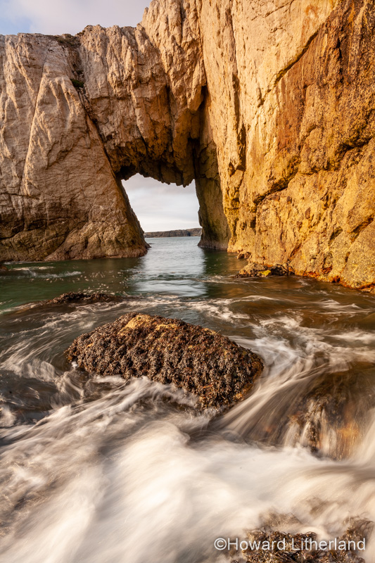 Bwa Gwyn sea arch near Rhoscolyn, Anglesey, North Wales