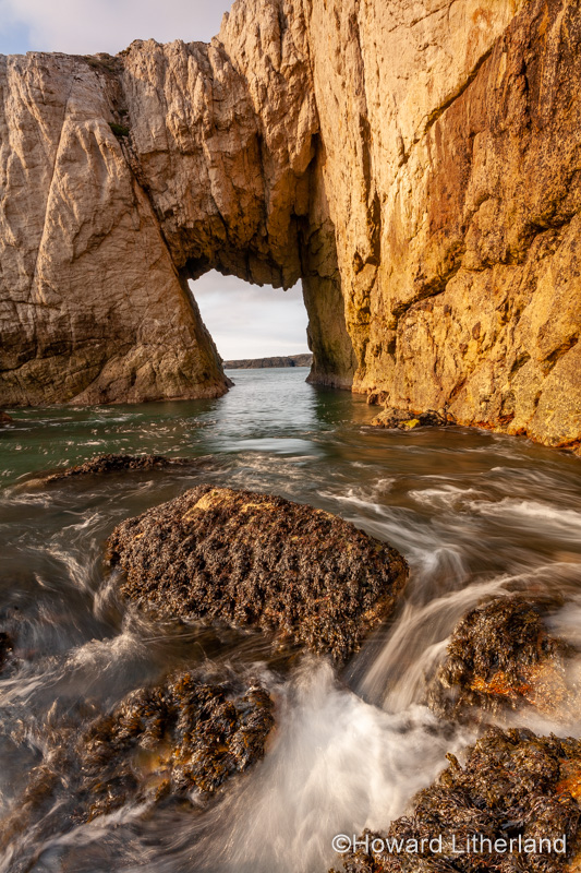Bwa Gwyn sea arch near Rhoscolyn, Anglesey, North Wales