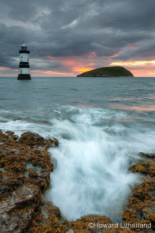 Penmon Point lighthouse and Puffin Island at dawn, Anglesey, North Wales