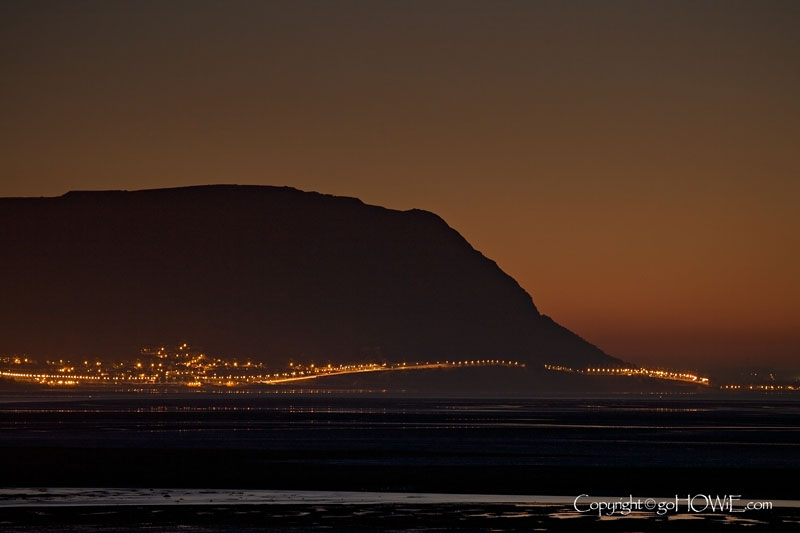 Beach and streetlights, Penmaenmawr, North Wales