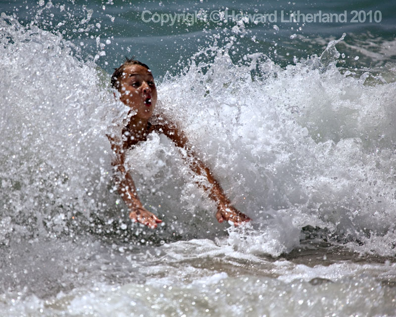 Boy in surf, Marbella, Spain