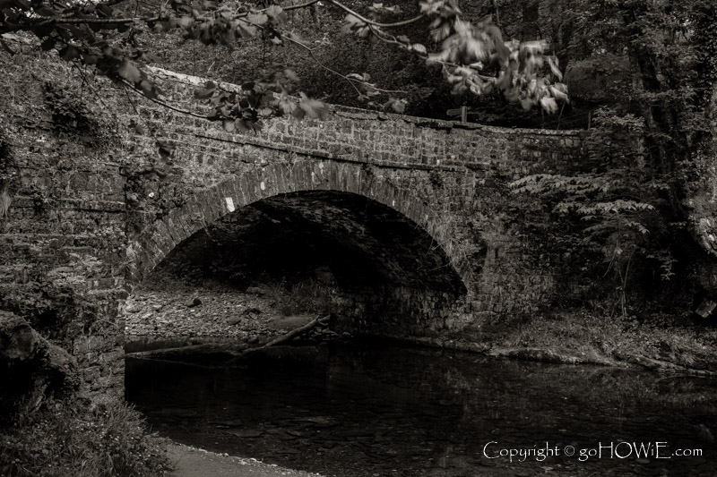 Old stone bridge Pont Melin-fach in the Brecon Beacons National Park, Wales