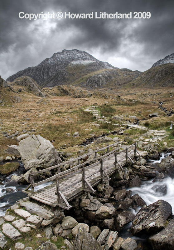 Old wooden bridge and Tryfan, Glyderau, Snowdonia