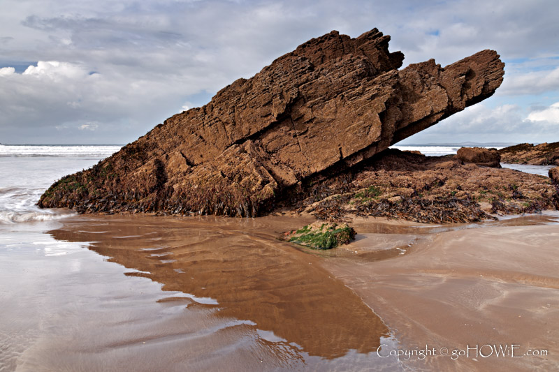 Rock formation in the sand on Broad Haven beach, Pembrokshire National Park, Wales