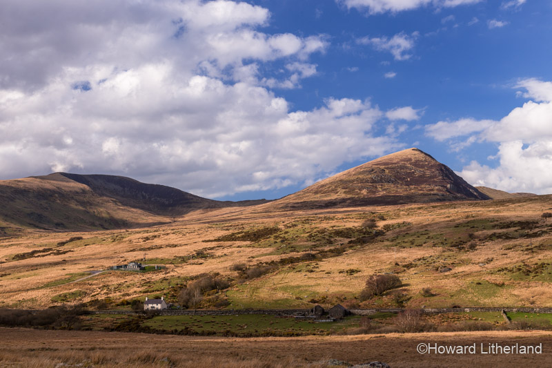 Clouds, mountains and isolated farm at Capel Curig in the Snowdonia National Park, North Wales