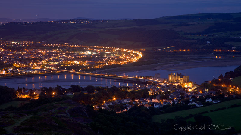 Conway castle and estuary at dusk, viewed from the top of the Sychnant Pass, North Wales