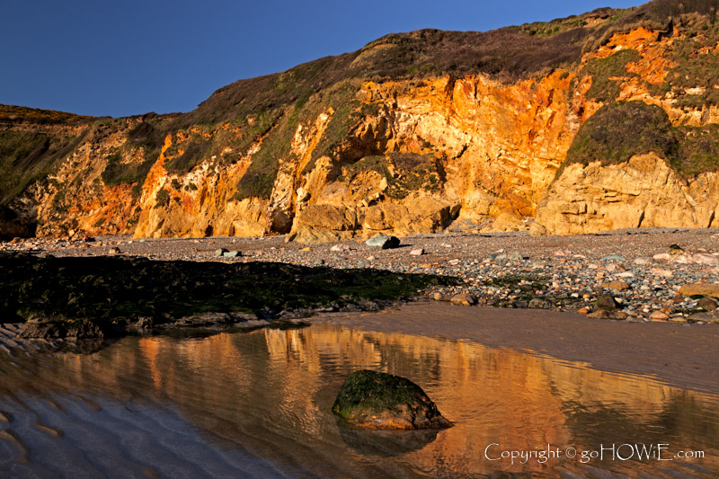 Beach, pool and cliffs at Church Bay, Anglesey