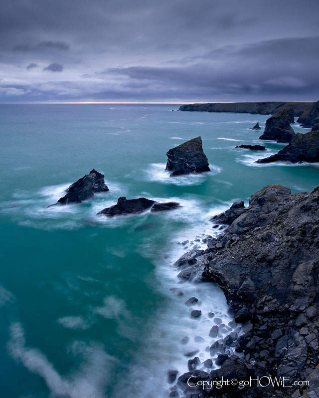Cliffs and waves at sunset, Bedruthan Steps, Cornwall