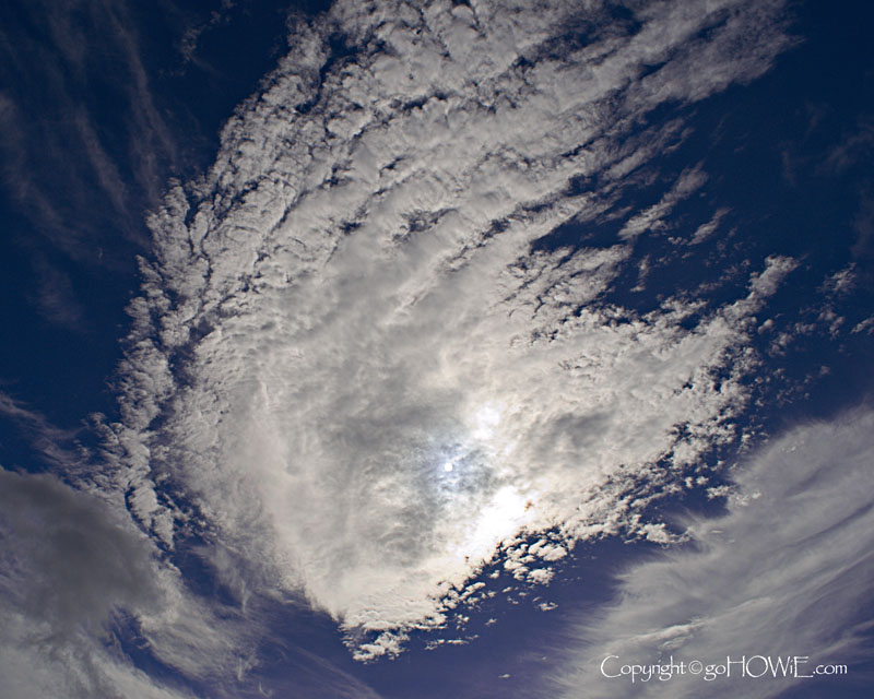 Altocumulus cloud with the sun shining through
