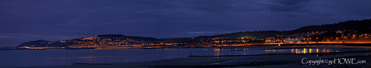 Panoramic stitch photo of Colwyn Bay at dusk on the North Wales coast