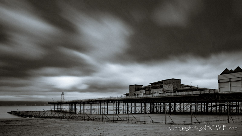 Derelict pier on the beach at Colwyn Bay on the North Wales coast